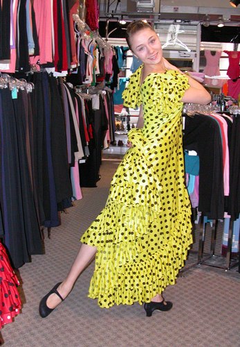 Cecilia is wearing a Yellow Sevillana Flamenco Dress Style DW899Y 